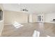 Spacious living room with a fireplace, plenty of natural light, and hardwood floors at 6775 W Woodcrest Dr, Greenfield, IN 46140