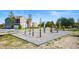 Community playground with exercise bars and seating areas at 746 Astor Dr, Carmel, IN 46032