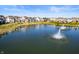 Aerial view of the community featuring a pond with a fountain at 754 Astor Ln, Carmel, IN 46032