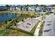 Aerial view of the community featuring a pond, a playground area, and a common space at 754 Astor Ln, Carmel, IN 46032