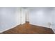 Cozy bedroom with hardwood floors, closet space, and fresh paint, perfect for relaxation at 7610 Brehob Rd, Indianapolis, IN 46217