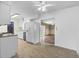 Bright kitchen with modern appliances, view to backyard, and open layout to living room at 7610 Brehob Rd, Indianapolis, IN 46217