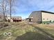 Expansive backyard view with a large metal outbuilding, perfect for storage or hobbies at 7811 W 700 S, Jamestown, IN 46147