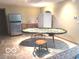 Finished basement featuring a card table, bar area and stainless steel refrigerator at 7811 W 700 S, Jamestown, IN 46147