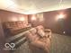 Finished basement featuring reclining seating, tiered floor, and movie theater lighting at 7811 W 700 S, Jamestown, IN 46147