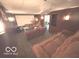 Basement features sofas with a large blank screen for watching videos and movies at 7811 W 700 S, Jamestown, IN 46147