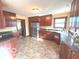 Kitchen features stainless steel appliances, cherry cabinets and solid surface countertops at 7811 W 700 S, Jamestown, IN 46147
