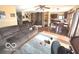 Inviting living room featuring wood floors, fireplace, and view into the kitchen at 7811 W 700 S, Jamestown, IN 46147