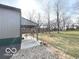 Outbuilding covered patio with comfortable seating, perfect for enjoying the outdoors at 7811 W 700 S, Jamestown, IN 46147