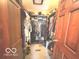 Walk-in closet with lots of hanging storage and places for shoes and bags at 7811 W 700 S, Jamestown, IN 46147