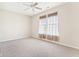 Spacious bedroom with neutral carpet, a ceiling fan, and bright natural light at 8535 Fenton Tower Dr, Indianapolis, IN 46259