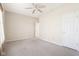 Neutral bedroom with carpeting, ceiling fan, and white trim at 8535 Fenton Tower Dr, Indianapolis, IN 46259