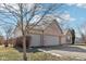 Beautiful home with a spacious two-car garage and lovely landscaping at 8535 Fenton Tower Dr, Indianapolis, IN 46259