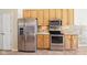 Kitchen view featuring stainless steel appliances and ample cabinet space for storage at 8535 Fenton Tower Dr, Indianapolis, IN 46259