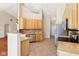 Well-lit kitchen boasts stainless steel appliances, tile backsplash, and granite countertops at 8535 Fenton Tower Dr, Indianapolis, IN 46259