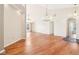 Spacious living room featuring hardwood floors and vaulted ceiling with chandelier at 8535 Fenton Tower Dr, Indianapolis, IN 46259