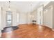 Elegant living room featuring hardwood floors and a stylish front door at 8535 Fenton Tower Dr, Indianapolis, IN 46259