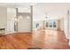 Expansive living space featuring hardwood floors, and an elegant chandelier at 8535 Fenton Tower Dr, Indianapolis, IN 46259