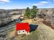 A view of the home with red roof, and the surrounding property and pond at 1001 N 750 W, Bargersville, IN 46106