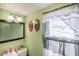 Charming bathroom with decorative mirror and soft lighting at 1001 N 750 W, Bargersville, IN 46106