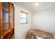 Simple bedroom featuring a comfortable bed, storage cabinet and a window at 1001 N 750 W, Bargersville, IN 46106