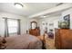 Spacious bedroom with wood furniture and natural light at 1001 N 750 W, Bargersville, IN 46106