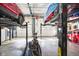 Functional garage interior featuring car lifts, tools, and storage, ideal for automotive work and maintenance at 1001 N 750 W, Bargersville, IN 46106