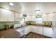 Bright kitchen features white cabinets, modern appliances, and a functional layout at 1001 N 750 W, Bargersville, IN 46106