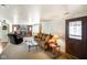 Inviting living room features a brick fireplace and ample seating at 1001 N 750 W, Bargersville, IN 46106