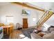 Inviting open-concept living space, filled with natural light, stairs to a loft and stylish furnishings at 1001 N 750 W, Bargersville, IN 46106