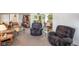 Spacious living room with hardwood floors, comfortable seating, and natural light at 1001 N 750 W, Bargersville, IN 46106