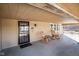 Inviting covered porch with two rocking chairs, offering a cozy spot to relax and enjoy the outdoors at 1001 N 750 W, Bargersville, IN 46106