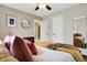 Comfortable bedroom features modern décor and ample natural light at 118 S 11Th Ave, Beech Grove, IN 46107
