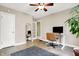 Stylish home office features a sleek desk and a convenient closet for storage at 118 S 11Th Ave, Beech Grove, IN 46107