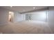 Finished basement featuring neutral carpeting, recessed lighting, and doorways to additional spaces at 12964 Walbeck Dr, Fishers, IN 46037