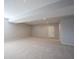 Spacious basement with neutral carpet, recessed lighting, and ample room for entertainment or storage at 12964 Walbeck Dr, Fishers, IN 46037