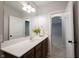Bathroom featuring a vanity, mirror, and doorway to another room, all illuminated by natural light at 12964 Walbeck Dr, Fishers, IN 46037