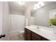 Well-lit bathroom with a shower, bathtub, and vanity with modern fixtures and ample counter space at 12964 Walbeck Dr, Fishers, IN 46037