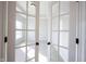 Bedroom with glass paneled doors, neutral carpet, grey paint and lots of natural light at 12964 Walbeck Dr, Fishers, IN 46037