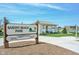 View of the Saxony Beach Park sign and lakeside gazebo at 12964 Walbeck Dr, Fishers, IN 46037