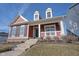 Charming red two-story home with a welcoming front porch and steps at 12964 Walbeck Dr, Fishers, IN 46037