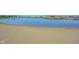 Scenic view of the lake with a sandy beach at 12964 Walbeck Dr, Fishers, IN 46037