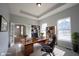 Bright office features a large desk, built-in bookcase, natural light and neutral paint at 12964 Walbeck Dr, Fishers, IN 46037
