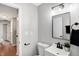 Bathroom featuring vanity, mirror, and black hardware at 1818 Arlene Dr, Indianapolis, IN 46219