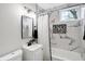 Updated bathroom featuring a sleek vanity, hexagon tile accents, and modern fixtures at 1818 Arlene Dr, Indianapolis, IN 46219