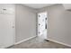 Carpeted bedroom featuring wood paneling and white trim at 1818 Arlene Dr, Indianapolis, IN 46219