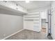 Bright bedroom with shelving and storage featuring neutral colors at 1818 Arlene Dr, Indianapolis, IN 46219