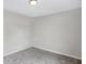 Neutral bedroom with gray carpet, light walls, and ample natural light at 1818 Arlene Dr, Indianapolis, IN 46219