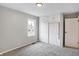 Bedroom featuring a sliding door closet and a window at 1818 Arlene Dr, Indianapolis, IN 46219