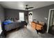 Cozy bedroom with neutral walls, a full bed, and carpet flooring at 1905 Apple St, Greenfield, IN 46140